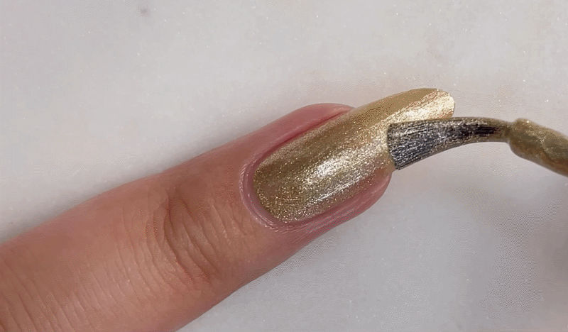 Billions Gold nail polish product shot. Long wearing, 10 free, non-toxic nail polish.