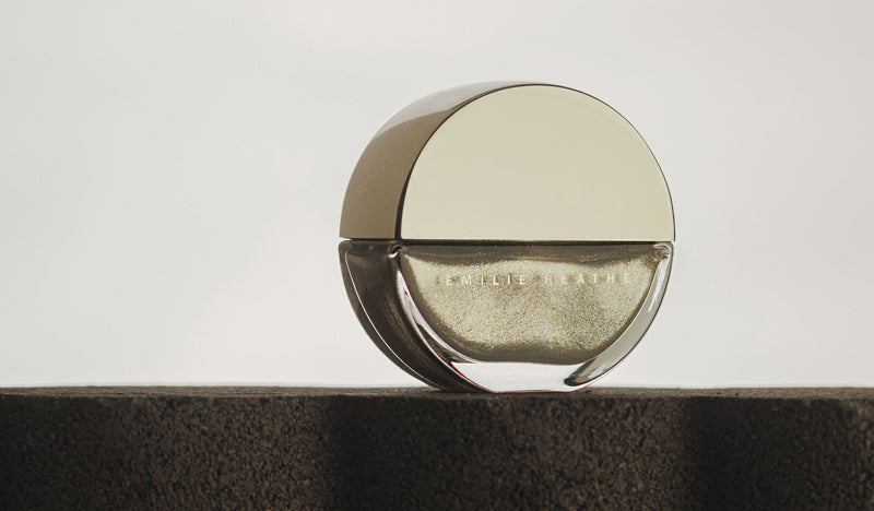 Billions Gold nail polish product shot. Long wearing, 10 free, non-toxic nail polish.