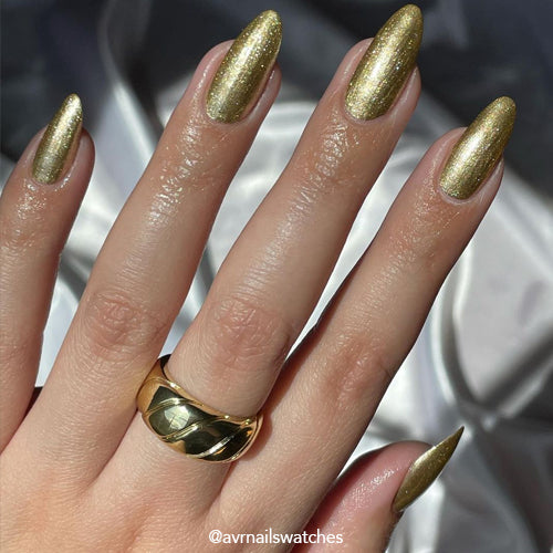Billions Gold nail polish product shot. Long wearing, 10 free, non-toxic nail polish.