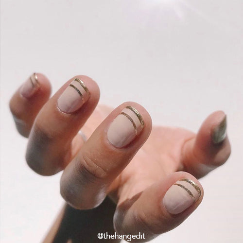 Billions Gold nail polish product shot. Long wearing, 10 free, non-toxic nail polish.