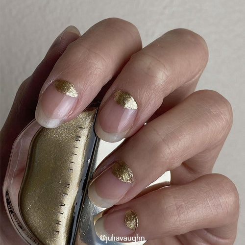 Billions Gold nail polish product shot. Long wearing, 10 free, non-toxic nail polish.