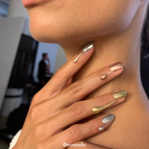 Mr.M Silver nail polish product shot. Long wearing, 10 free, non-toxic nail polish.