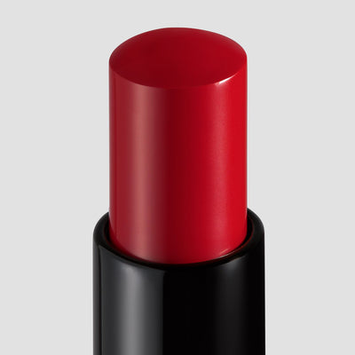 212 red lipstick product shot closeup. Moisturizing, nourishing, hydrating, antioxidant-rich, and botanical-infused formula.