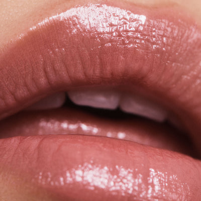 As If Beige Nude lipstick on Asian model. Moisturizing, nourishing, hydrating, antioxidant-rich, and botanical-infused formula.