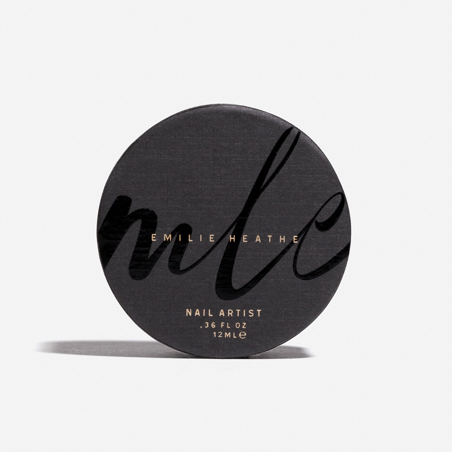 emilie heathe nail polish outer round carton made of recycled and recyclable materials.